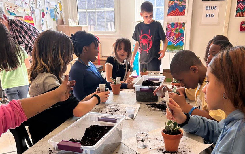 CONNECT students learned to read the labels when preparing young plants – different types have different needs!