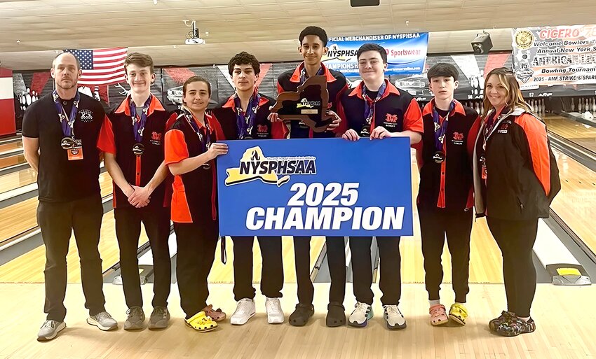 Marlboro bowlers celebrate their state championship this past weekend in Syracuse.