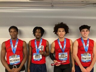 The Sprint Relay Team finished in 4th the Championship Division at The Nike Indoor Nationals with a time of 3:32.58 (l. - r.) De Juan Mc Kenzie, Giwenn Eloge,Gianni Graham, and Brady Danyluk.
