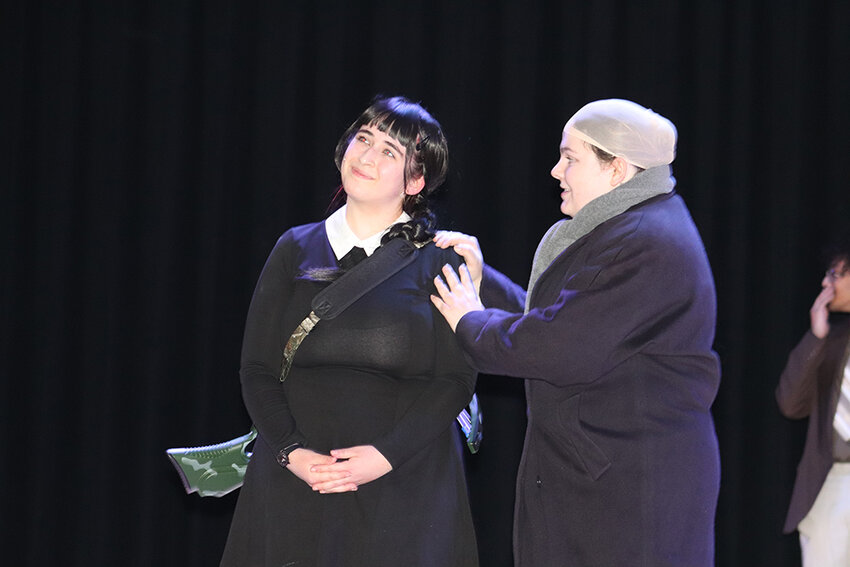 Lorelei Donaldson as Wednesday Addams and Emily Fitzgerald as Uncle Fester.