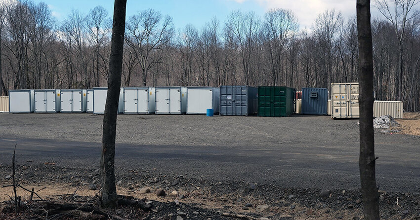 The approval of a container storage site by the Plattekill Town Board remains under scrutiny.