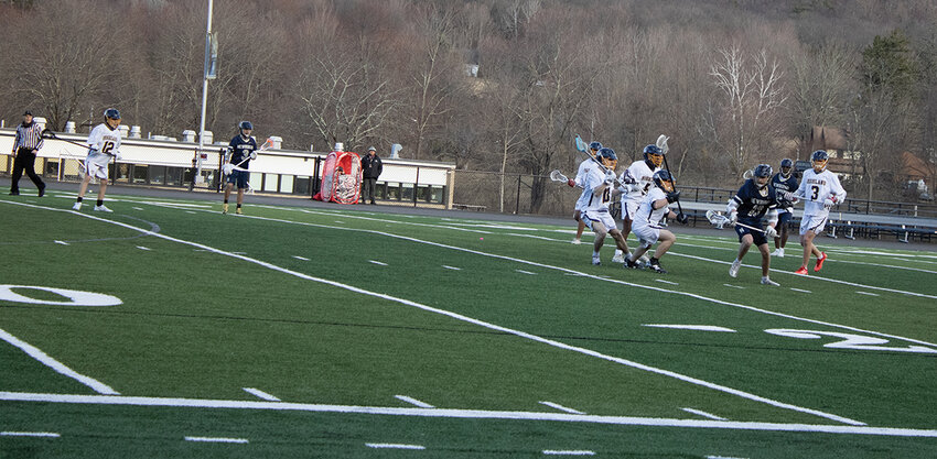 Andrew Terranova and Quinn Berean defend for Highland.