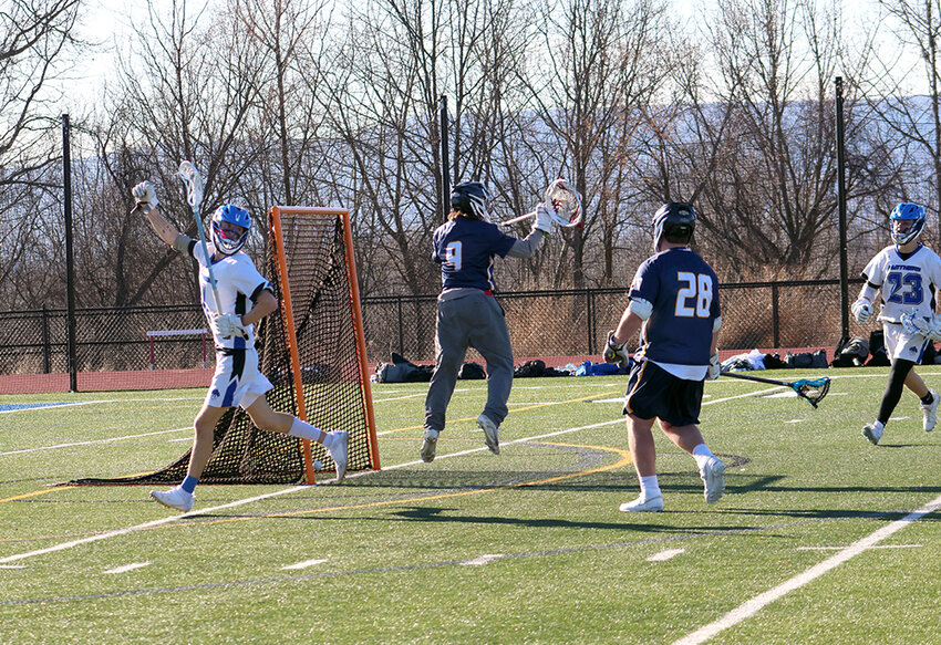 Wallkill’s Brent DeCoeur scores against Pine Bush.