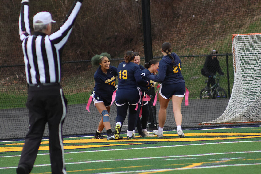 Huskies celebrate a touchdown in last week’s game against Valley Central.