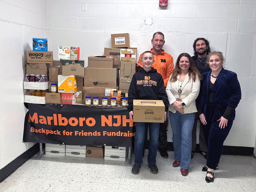 Front row (left to right): Marlboro Middle School (MMS) Grade 8 student Zachary Dina, Principal Debra Clinton, and National Junior Honor Society (NJHS) Co-Advisor Andrea Viviani. Back row (left to right): MMS Assistant Principal Demian Stanmyer and NJHS Co-Advisor Daniel Nicosia.