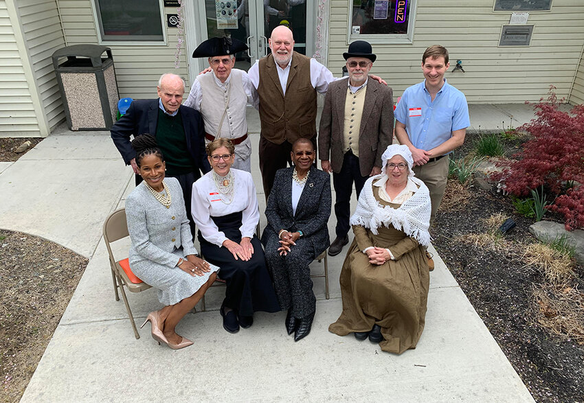 The Town of Highlands Historical Society, led by town historian Ronnie Coffey, (front row, 2nd from left) spearheaded a unique approach to this year&rsquo;s &ldquo;fifty people&rdquo; event by having members dress in the attire of the people that they represented from Highland Falls. The reenactors are pictured here with Alex Prizgintas (right), town historian of Woodbury and organizer of the fifty people event.
