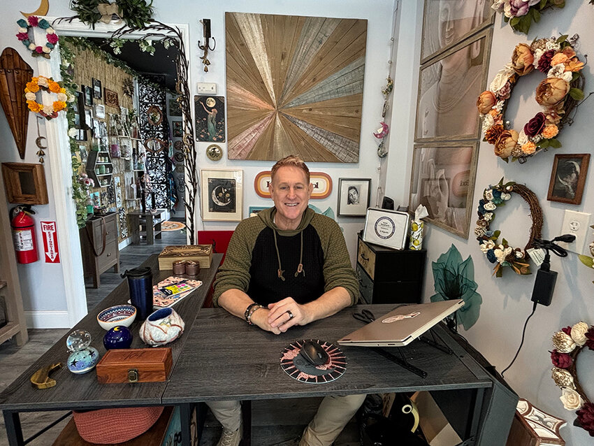 Keith Dougherty, the owner of Mooka Moon, inside his shop.
