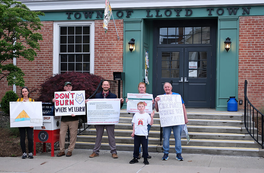 A number of Highland residents protested at Town Hall prior to a Zoning Board meeting on a proposed pet crematory