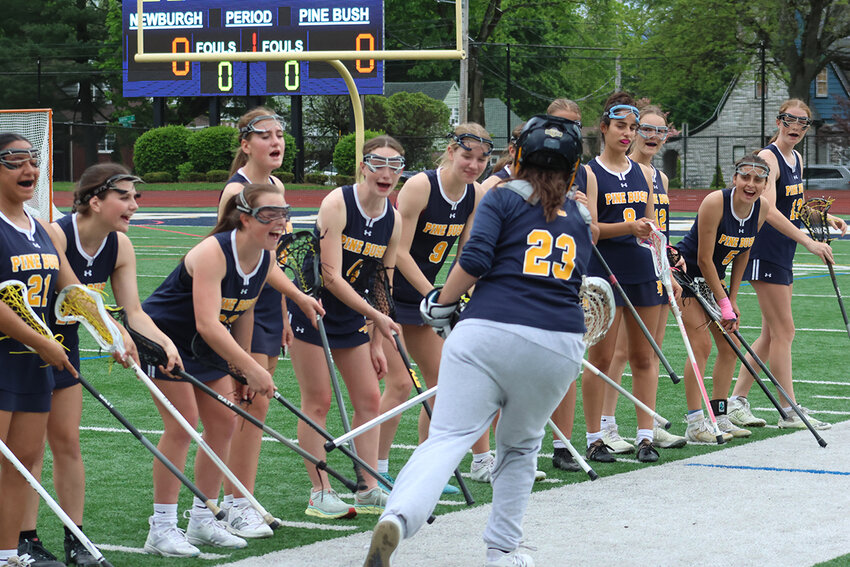 Pine Bush goalie Camryn Kodgis is greeted by teammates as she enters the field for last Wednesday&rsquo;s game at Newburgh.