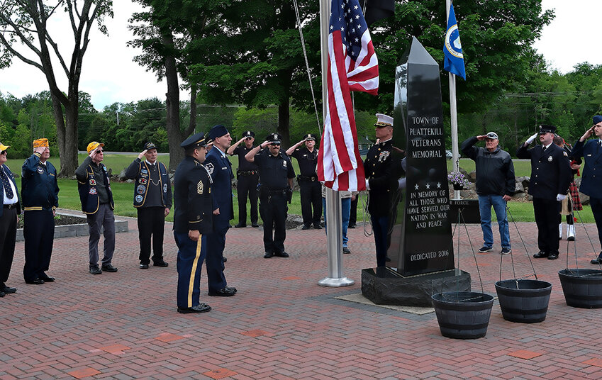 USMC Col. Stuart C. Smith Jr. raised the United States Flag for the ceremony
