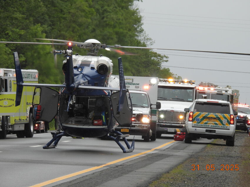 A helicopter lands on the Thruway to transport one injured person to Westchester Medical Center