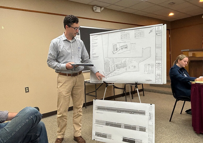 Connor McCormack of Collier’s Engineering and Design presenting Avion Enterprises LLC’s warehouse project during Crawford’s May 28 planning board meeting.