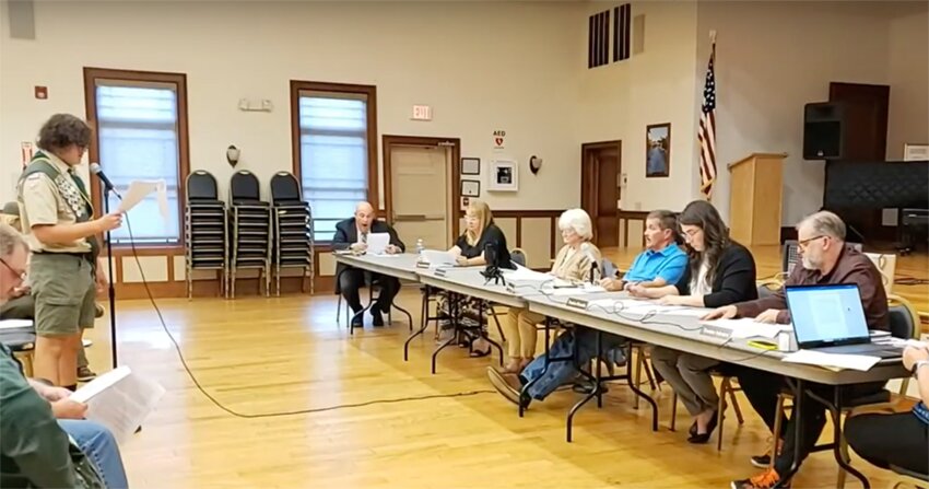 Boy Scout Frank Meyer (left) presenting his Eagle Scout project to board members and residents during the village’s May 20 meeting.