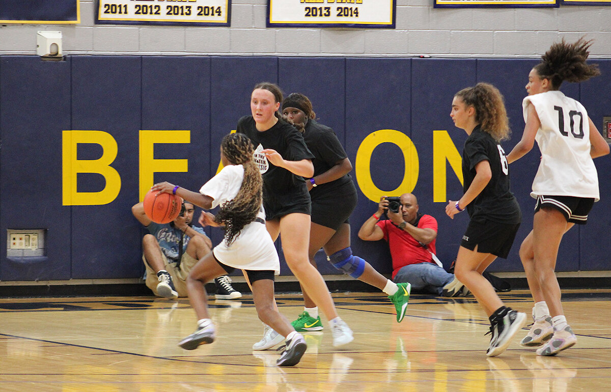 Lady Lions make debut at ‘It's In The Water' Classic The Newburgh Zion Lions Elite 16U and 17U girls' basketball teams made their official debut at the It's In The Water Classic on Friday, July 25, at Beacon High School. The annual event, … This item is available in full to subscribers. Attention subscribers To continue reading, you will need to either log in to your subscriber account, below, or purchase a new subscription. Please log in to continue Need an account? Print and web subscribers If you're a print and web subscriber, but do not yet have an online account, click here to create one. Online-only subscribers If you are a digital subscriber with an active, online-only subscription then you already have an account here. Just reset your password if you've not yet logged in to your account on this new site. Non-subscribers Click here to see your options for becoming a subscriber. Lady Lions make debut at ‘It's In The Water' Classic Posted Wednesday, July 30, 2025 By Alberto Gilman The Zion Lions program, founded more than 30 years ago by Coach Harold Rayford Sr., is a nonprofit dedicated to youth development through basketball. Based in Newburgh, the organization provides a safe and competitive environment for young athletes, hosting leagues and tournaments throughout the region. The girls' teams, reestablished in 2023 and now designated as “Elite,” wrapped up strong seasons. The 16U team finished 24-5, while the 17U squad went 16-6 under head coach Ali Muhammad, a Zion Lions alumnus. The Elite status signified expanded competition, including travel tournaments and high-level opponents, similar to the organization's boys' teams. Leading the way were team captains Terri'nashjaè “TT” Burden of Newburgh Free Academy, Tessa Furst of Cornwall, and Abigail Richardson of James I. O'Neill High School. Burden led both teams in scoring, assists, steals and shooting percentage. Furst emerged as a rebounding force and defensive presence, while Richardson served as an on-court extension of the coaching staff. The Friday showcase featured Burden, Furst, Ana Sonko of Cornwall, and Jasmine Triunfo of Arlington. Burden, Furst, and Triunfo played on the Black team, while Sonko suited up for the White team. The Black team secured a 71-40 win. Burden was named Most Valuable Player and said she enjoyed the experience despite some early nerves. “It wasn't too crazy, but at first it was because I never played with some of those girls before,” she said. “Then I got comfortable.” Furst echoed the excitement. “Right from the start, when we were warming up, I could tell the girls had really nice energy,” she said. “Everyone was really supportive, and I knew regardless of whether we won or lost, I still would have had a lot of fun.” Triunfo said she was confident in her shooting and appreciated the opportunity to bond with new teammates. “Some of us had already played together, so we knew each other's games, and it was a good experience to play with others,” she said. Sonko, who played on the opposing team, contributed defensively and said she enjoyed the competitive atmosphere. “It was nice seeing my teammates fired up,” she said. “We had good energy, and we kept going and fighting.” All four players said they hope the event helps bring more girls into the program and opens the door to additional tournaments and development opportunities. Tryouts for the 2026 Newburgh Zion Lions Elite 16U and 17U teams are scheduled for Sunday, Feb. 15. Free weekend workouts are available for returning players and interested newcomers. For more information, contact Coach Muhammad at 845-728-8746.