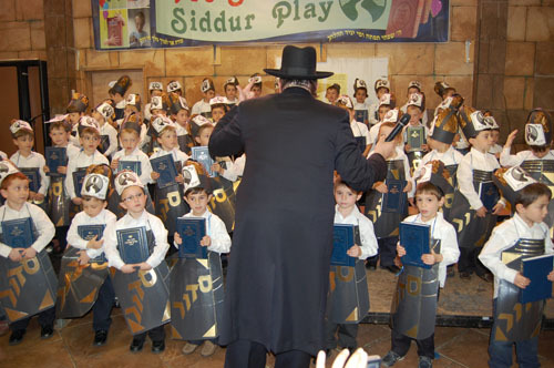 Students at Yeshiva Darchei Torah put on a siddur play.