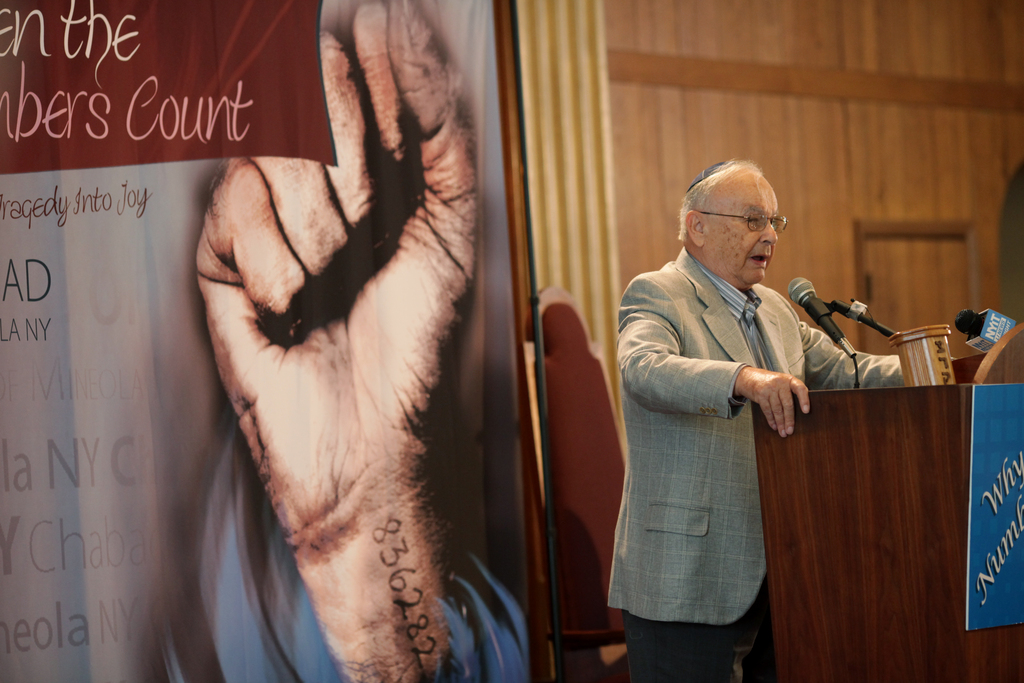 Jack Rosenthal speaks about his experience at Auschwitz during a program at Congregation Beth Sholom Chabad of Mineola, Wednesday, June 30, 2010.
