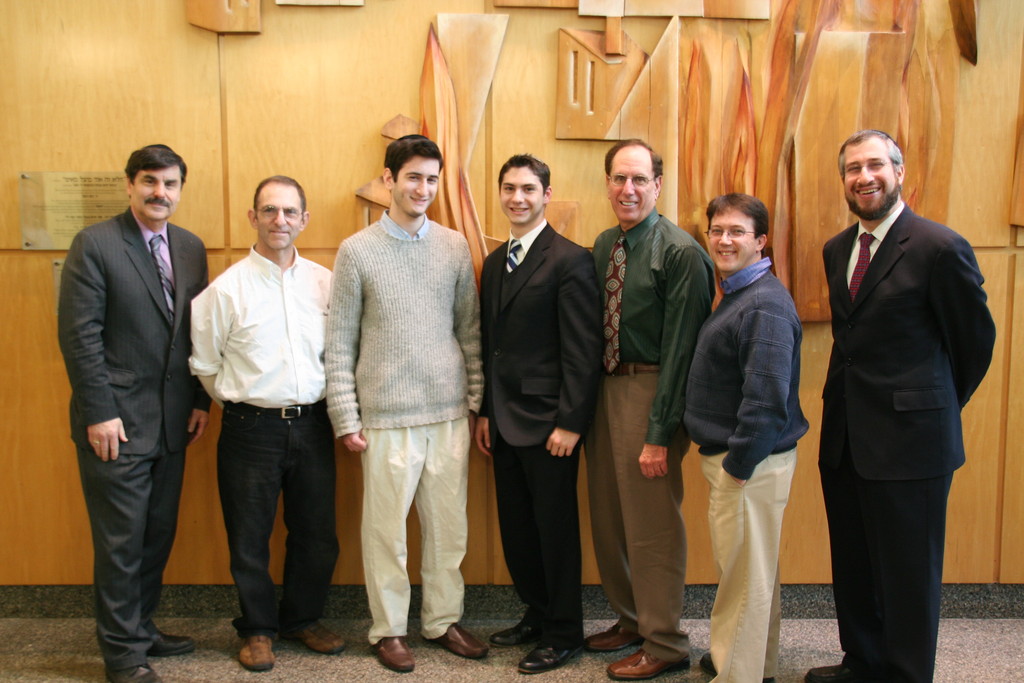 From left to right: Mr. Harvey Feldman, General Studies Principal, Dr. Robert Winston, Yonatan Edelstein,  Avi Moisa, Mr. Gerald Schmugar, Mr. Stephen Sullivan, Rabbi Yisroel Kaminetsky, Menahel