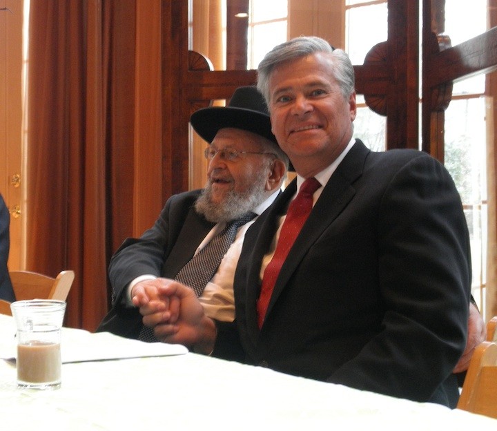 Senate Majority Leader Dean Skelos meets with Rabbi Binyamin Kamemetzky at a breakfast reception on March 6.