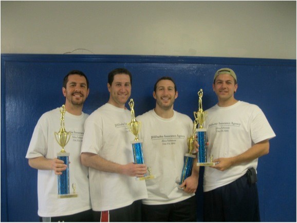 Jeremy Frenkel, David Jesselson, Jared Solomon, and Kenny Sicklick with first place trophies in hand.