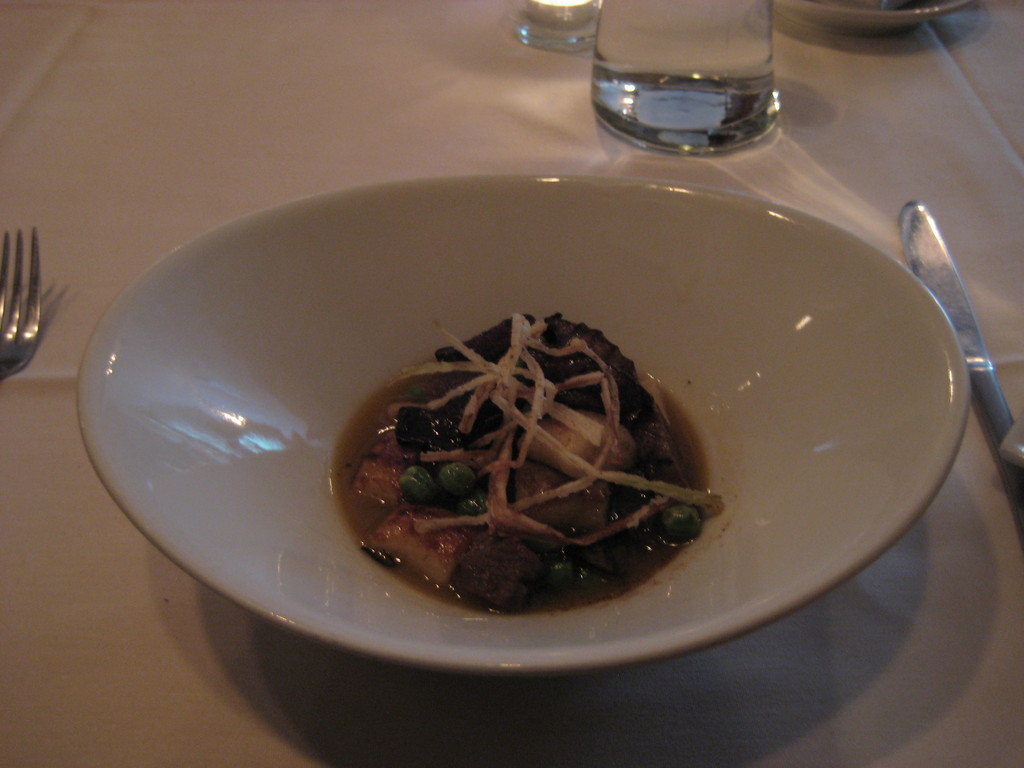 A mushroom gnocchi with braised beef cheek amid light marrow broth at Etc. Steakhouse.