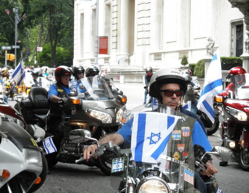 Chai Riders motorcycle club roared up Fifth Avenue in full patriotic display.
