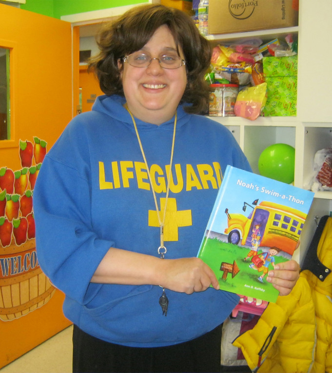 Author and illustrator Ann Koffsky with her book Noah&rsquo;s Swim-A-Thon.