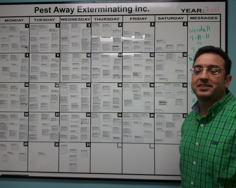 Pest Away CEO Jeff Eisenberg keeps a tightly organized list of clients on his wall, ranging from Midtown offices to private residences.