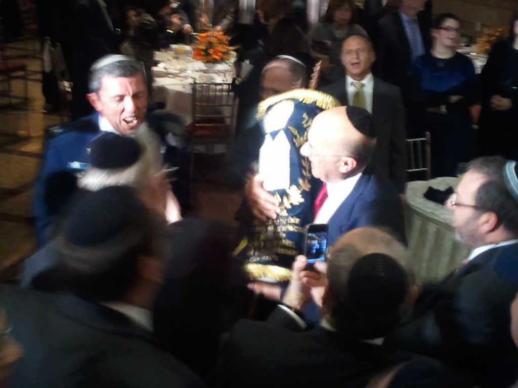 Young Israel donated its 201st sefer Torah to the Israel Defense Foreces at its centennial dinner.