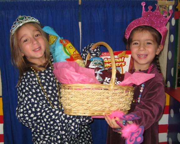 Along with their classmates at the JCC of the Greater Five Towns&rsquo; Nursery School, pre-schoolers Aly Lichter of Woodmere and Sophia Friedman of Lawrence celebrate Purim by preparing mishloach manot, gifts of food and drink.&nbsp; The children dressed in costumes to celebrate&nbsp;the&nbsp;story of Purim.  &nbsp;For more information on the nursery school and other programs off-  ered at the JCC of the Greater Five Towns visit www.fivetownsjcc.org or   call 516-569-6733.  &nbsp;The Jewish Community Center of the Greater Five Towns is a beneficiary agency of the United Jewish Appeal (UJA) Federation of New York, a member agency of the United Way of Long Island, the Jewish Community Centers Association and an affiliate of   the Five Towns Community Chest. It serves the communities of Cedarhurst,   East Rockaway, Far Rockaway, Hewlett,   Inwood, Lawrence, Lynbrook, Malverne, Valley Stream, West Hempstead,   and Woodmere.