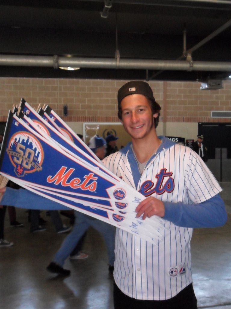 Zachary Finkelstein, 18, of Woodmere, home from Israel from Yeshivah Netiv Aryeh, enjoys the Mets Pre- Pesach opening day at CitiField. Mets beat the Braves 1-0.