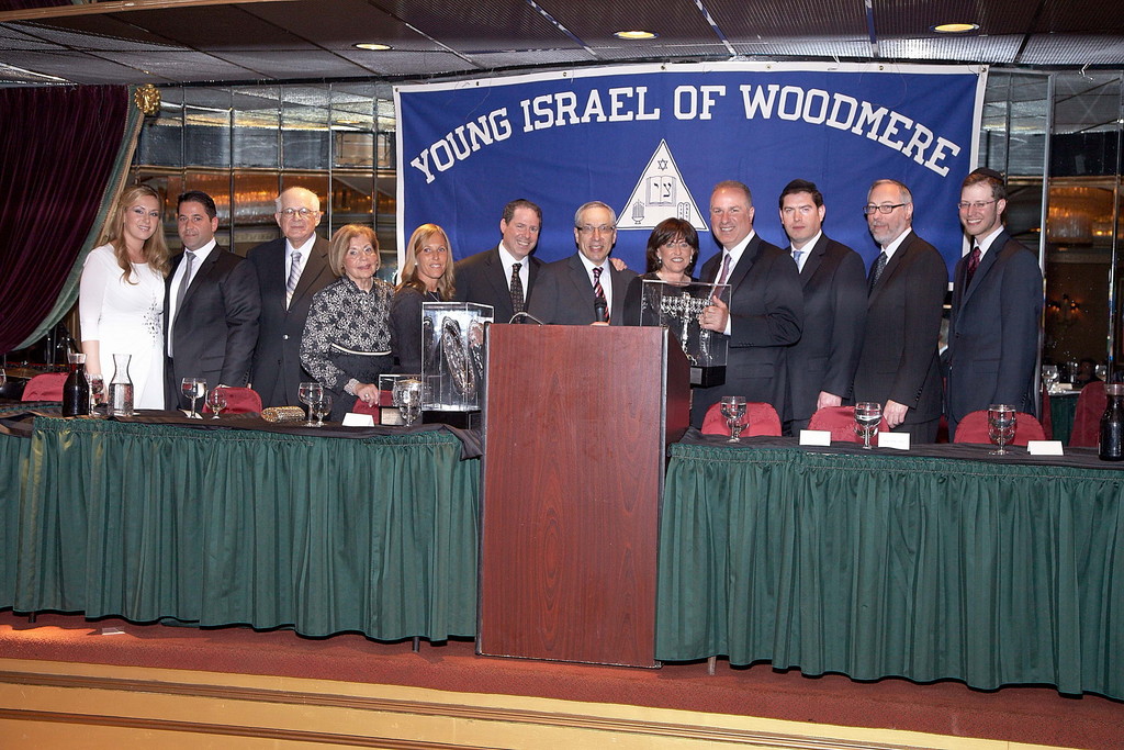 Young Israel of Woodmere honorees Yaakov and Tzila Morgenstern, Max and Audrey Wagner, Stephen and Tammy Wagner, Stuart and Terri Wagner with Rabbi Herschel Billet, Rabbi Shalom Axelrod, Rabbi Dr. Aaron Glatt and Rabbi Eliyahu Wolf at recent dinner held at The Sands of Atlantic Beach.
