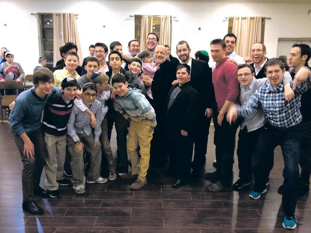 Har Torah Assistant Principal Rabbi Yisrael Silverman, left, and  Rabbi Ahron Rosenthal, Director of Student Activities, right with 8th grade boys at Yachad shabbaton.