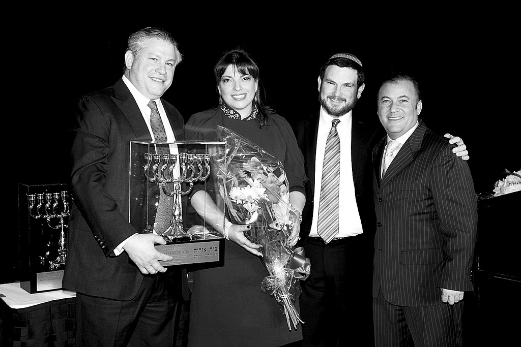 The Beit Orot dinner honoring Alyssa &amp; Chaim Winter of Cedarhurst, along with Yocheved &amp; Bennett Deutsch of Teaneck, NJ, and Renee &amp; Moshe Glick of West Orange, NJ, took place on Tuesday evening, January 8, 2013, at the Crowne Plaza in Times Square, NYC. Jewish radio personality Nachum Segal served as the evening&rsquo;s MC and Naftali Bennett, the recently elected head of Israel&rsquo;s Bayit HaYehudi (Jewish Home) party, delivered the keynote address via live webcast. Beit Orot, anchored by a hesder yeshiva, represents the first living Jewish presence on the Mount of Olives in more than 2,000 years. The organization is dedicated to restoring the Jewish neighborhoods of the Mount of Olives Ridge in historic Jerusalem and to educating the masses about Jerusalem&rsquo;s ancient and modern Jewish history.       L to R: Chaim and Alyssa Winter, Shlomo Zwickler, Executive Director, Beit Orot, and Seth Schreiber, Chairman of the Board of Directors of Beit Orot, also of Cedarhurst.