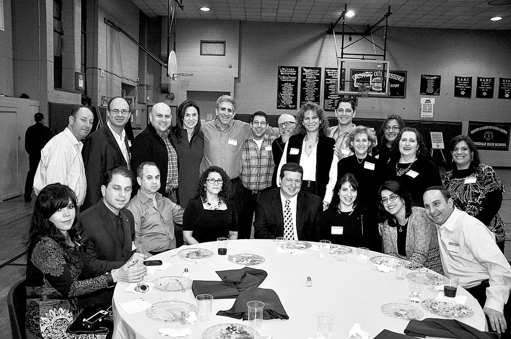 Hebrew Academy of Nassau County alumni enjoy a reunion with a 1980s theme reminiscent of their time in school.