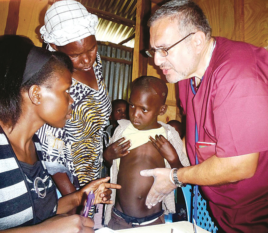 80 orphans were examined by Dr. Richard Sartori, a pediatrician from Garden City Pediatrics, on November 28 and 29.