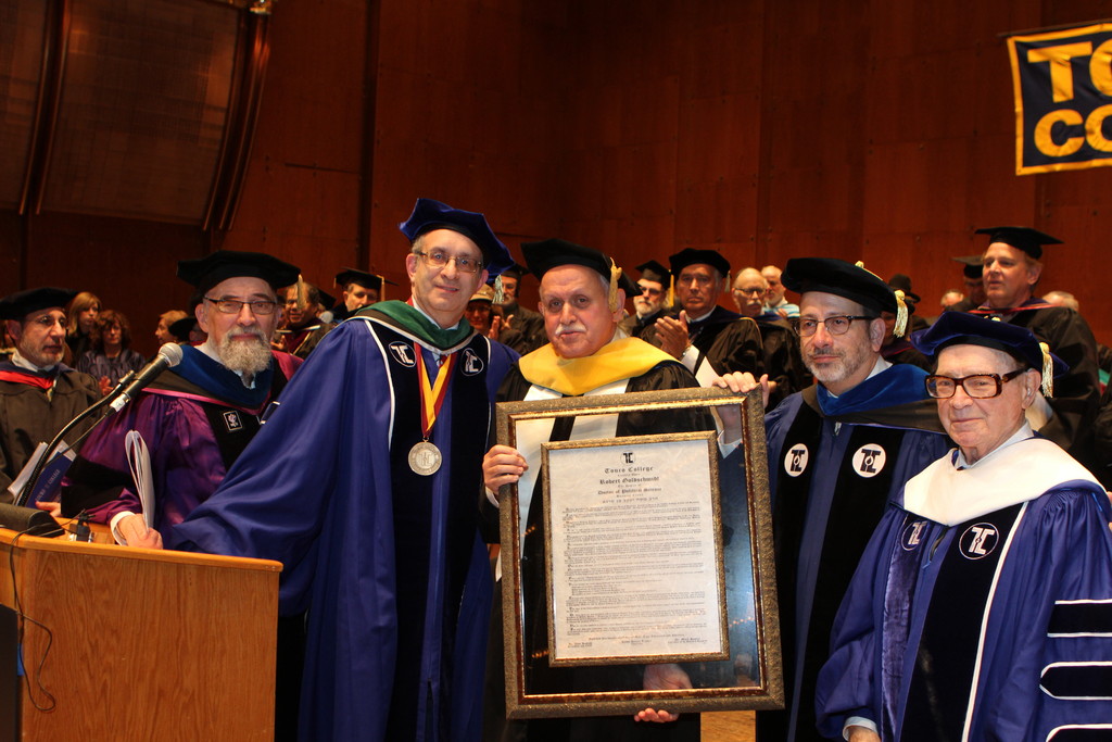 Dean Robert Goldschmidt received an honorary doctorate at Touro College&rsquo;s commencement. Pictured l-to-r: Dr. Stanley Boylan, vice president for undergraduate education and dean of faculties; Dr. Alan Kadish, president and CEO; Dean Goldschmidt; Rabbi Moshe Krupka, executive vice president; and Dr. Mark Hasten, chairman of the board of trustees.