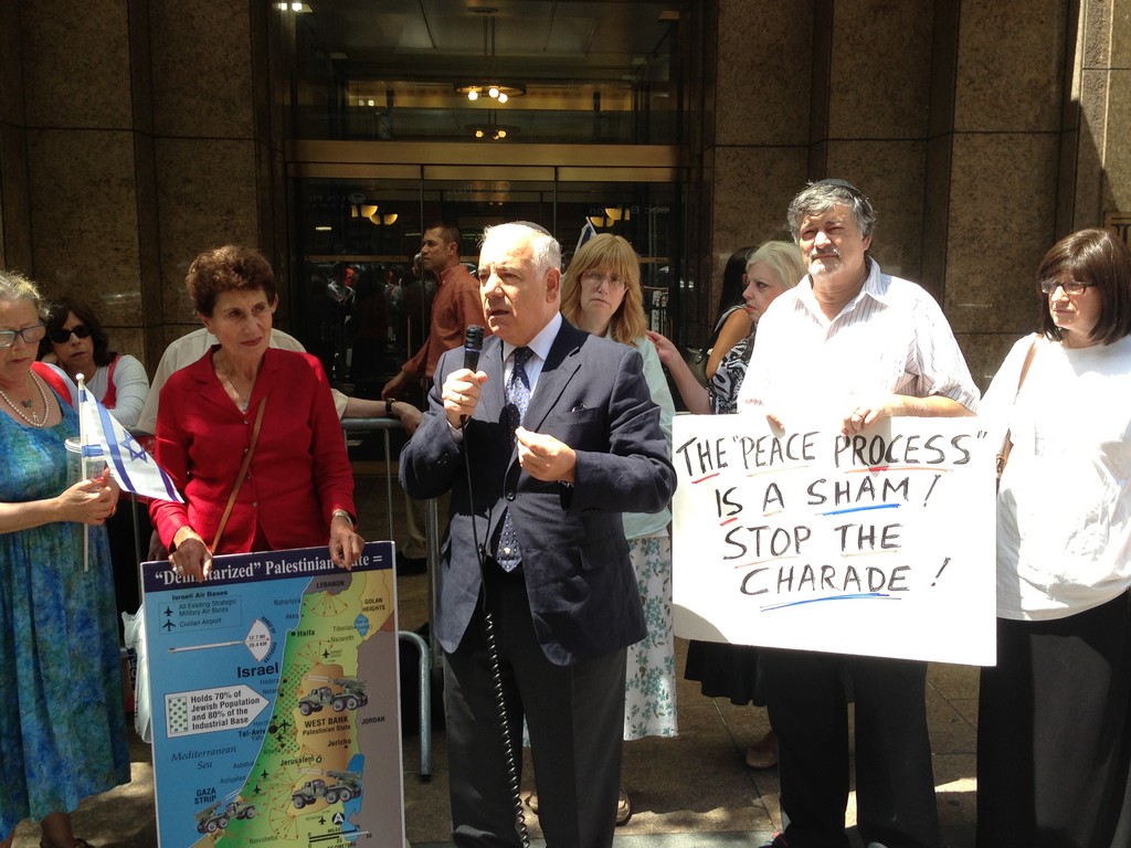 Standing opposite the Israeli consulate on Second Avenue in Manhattan, New Yorkers protested the release of Palestinian killers by Israel. From left: Helen Freedman, executive director Americans For a Safe Israel; Rabbi David Algaze of Havurat Yisrael of Forest Hills; protest organizer Tamar Adelstein, and Dr. Paul Brody of Great Neck. The 104 prisoners have &ldquo;blood on their hands,&rdquo; said Brody. Rabbi Algaze is president and Dr. Brody vice president of the International Committee for the Land of Israel.