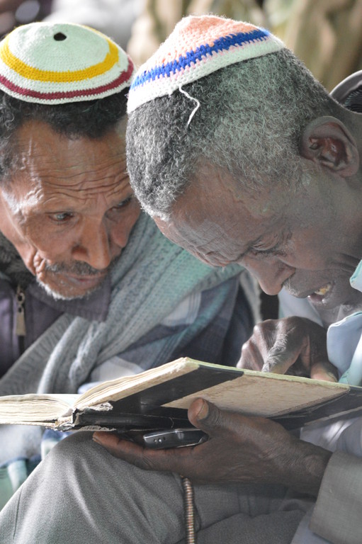 Two men inside the synagogue in Gondar, Ethiopia.