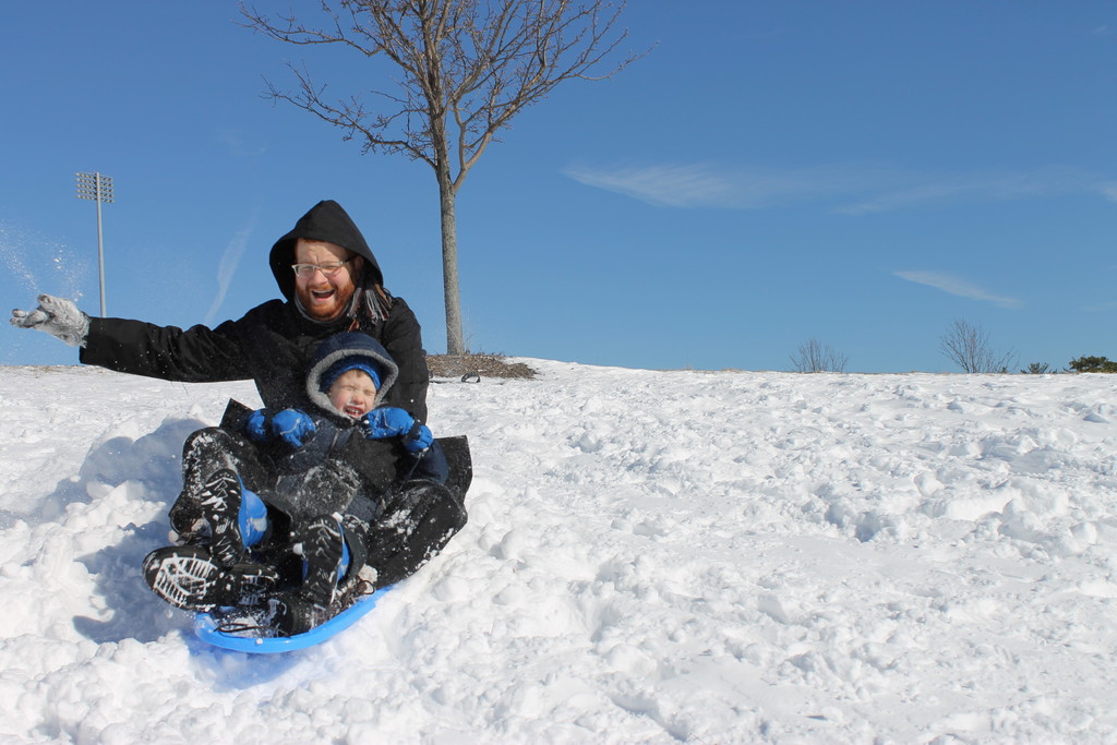 Father-son fun    From shoveling to snowboarding, snow days can be a family experience. Rabbi Abi Goldenberg, Rosh HaYeshiva at Nishmas HaTorah of Lawrence, rides with his son Yosef near his home in Lakewood after last Sunday