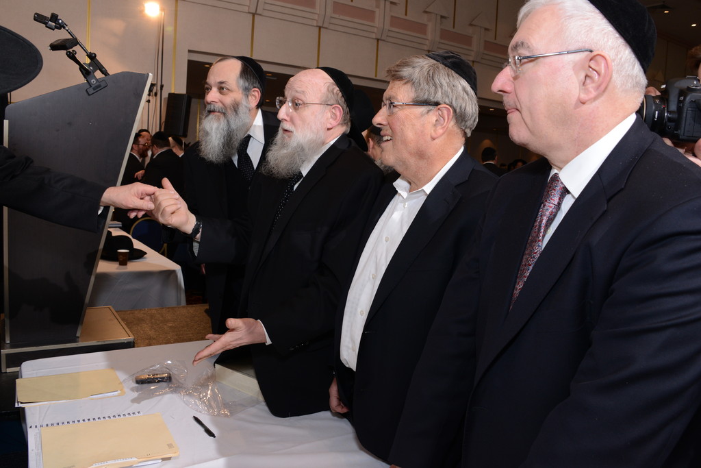At left Rabbi Mordekai Shapiro of Ohr Torah of N. Woodmere and Rabbi Yitzchok Frankel of Agudath Israel of the Five Towns speaking with Rav Yaakov Perlow at Agudath