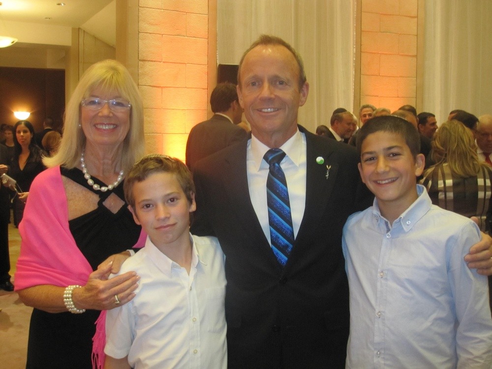 Former Canadian cabinet minister Stockwell Day and wife Valorie, with Israeli boys who each lost fathers in a terrorist attack, at a state dinner during Canadian Prime Minister Stephen Harper
