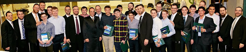 Prize winners and honored rabbi at DRS parent-son event.