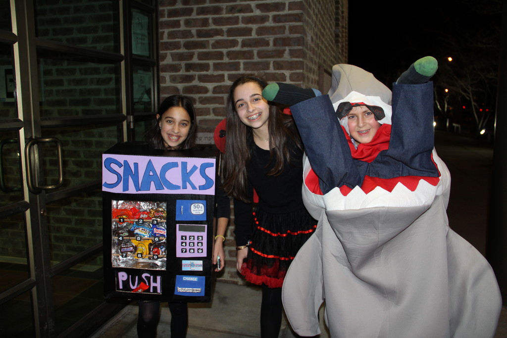 Woodmere takes Purim very seriously. At the Young Israel of Woodmere, a  snack machine (Sarah Feder) and shark (David Schwartzstein) flank a ladybug (Kayla Giller)The Jewish Star photos by Christina Daly (YI Woodmere)