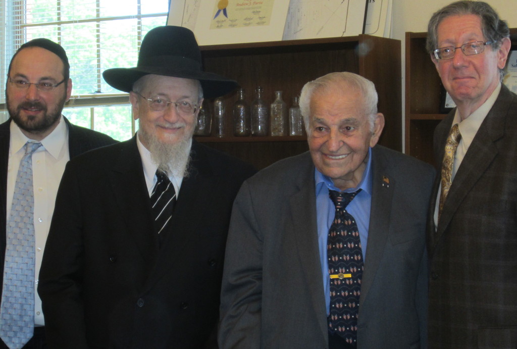 From left: Yeshiva Derech HaTorah principal Rabbi Ben Zion Unger, Rabbi Yaakov Feitman, Mayor Andrew Parise, and The Jewish Star Kosher Bookworm columnist Alan Jay Gerber