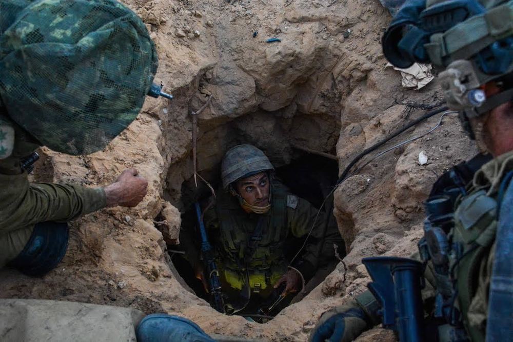 Israeli soldiers from the Givati Brigade seen at the entrance to a Hamas terror tunnel during Operation Protective Edge.