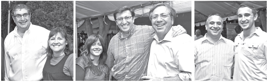 From left: Organizers of the West Hempstead fundraiser for the One Israel Fund, Alan and Sharon Shulman; Amy and Dov Kesselman and Larry Beck; Scott Feltman and guest speaker at the BBQ, Mickey Zivan, who discussed his friendship with Eyal Yifrach, hy