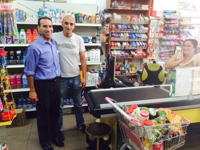 Stuart Katz with manager Ilan of Chen Market in Sderot, southern Israel.