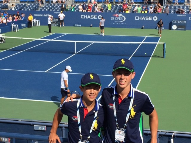 Brothers Daniel and David Soffer of Woodmere pose overlooking the courts during a break at the U.S. Tennis open where they worked as ballpersons during the event that ended on Monday.
