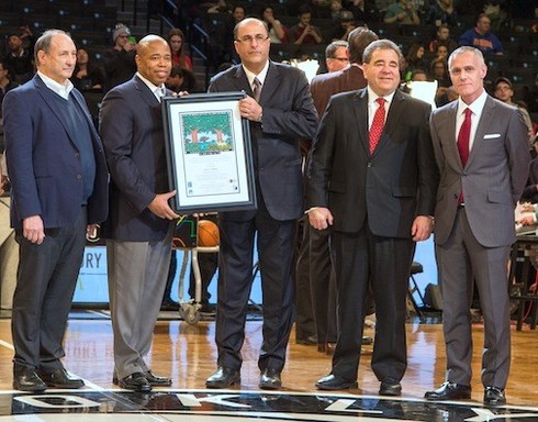 On the court at Barclays Center, left to right: Nassau Coliseum developer Bruce Ratner, Brooklyn Borough President Eric Adams, Israel Consul General Ido Aharoni, Russell Robinson of JNF and CEO of the Brooklyn Nets and Barclays Center Brett Yormak.