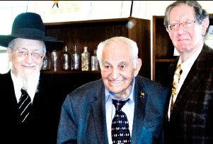 At Cedarhurst Town Hall in 2014 for a disucssion with high school students Mayor Andrew Parise is flanked by Rabbi Yaakov Feitman and The Jewish Star Kosher Bookworm columnist Alan Jay Gerber.